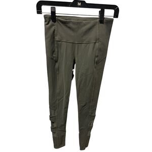 Athleta Salutation Stash Pocket II Laser Cut 7/8 Tight Leggings – Olive Green XS